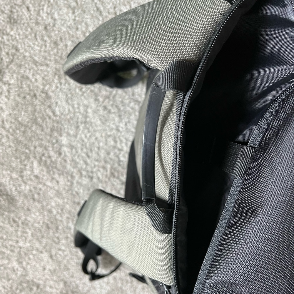 Olive green roll top backpack
